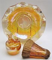 All three Jeannette Glass pieces grouped together