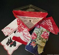 Overall view of five hankies and Hommer's triangular box