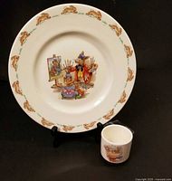 Front view of plate on stand with egg cup