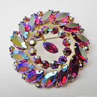 Front view showing full circular design of rhinestone brooch