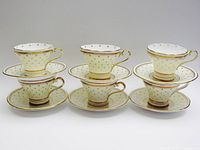 All six cup and saucer sets arranged