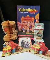 Lot overview showing book and four cards