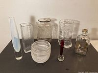 Group shot of all seven glass pieces