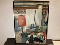 Full view of framed oil painting showing studio scene