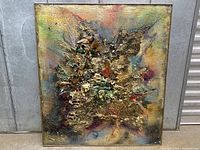 Full view of textured abstract mixed media painting on wood board