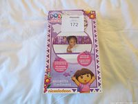 Front of Dora the Explorer Inflatable Safety Bumper retail box