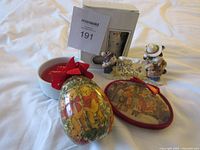 All items together showing ornament box, figurine, tin ornament, oval ornament, ceramic bowl