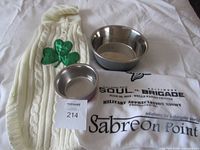 Sweater, two bowls, white printed cloth displayed together