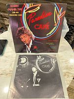 Front of album jacket and lyric inner sleeve displayed