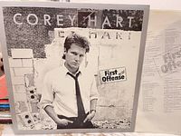 Front cover of Corey Hart First Offense LP and inner sleeve text visible