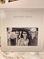 Front cover of Howard Jones Human's Lib LP showing artist name and portraits