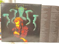 Front jacket and printed inner sleeve lyric side visible