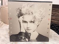 Front cover showing Madonna portrait and album title