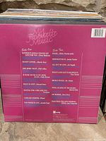 Back sleeve showing full track listing and sleeve condition