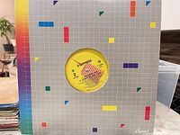 Front view of 12" vinyl in printed sleeve