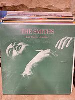 Front cover of The Smiths The Queen Is Dead LP
