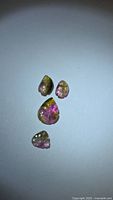 Four leaf-cut watermelon tourmaline stones