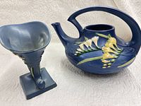 Front view of both Roseville pieces: Freesia teapot and Wincraft cornucopia vase