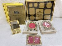 Group shot of all brass frames showing sizes and packaging