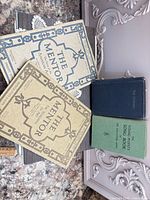 Front covers of The Mentor (two visible), The Hymnary, Young People's Song Book