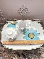 Full set on tray with ruler for scale