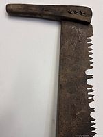 Close-up of upper handle, fasteners and teeth