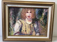 Front view of framed oil painting showing portrait and signature