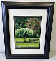 Full view showing framed painting with mat