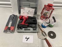 All items overview: drill set in case, flashlight, lanterns, trowel, pliers, grinding wheel