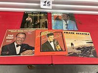 All five record jackets laid out on table