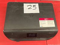 Top and front view of HP Envy 5530 printer scanner