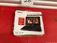 Front of Akai 9-inch portable DVD player box