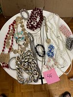 Overview of all jewelry pieces on round table