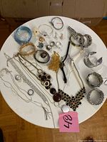 All jewellery pieces laid on round table
