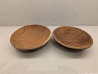 Top view of both wooden bowls showing grain patterns