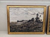 Landscape print with open field and shrubs in gold frame