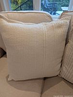 Front view of one pillow showing texture and color