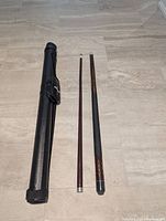 Cue disassembled with case showing components