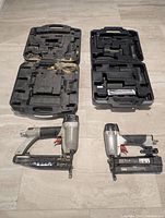 Two Porter-Cable nailers and two cases displayed