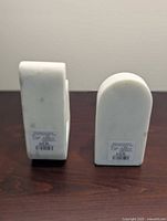 Bookends upright showing front and side profiles with retail stickers visible