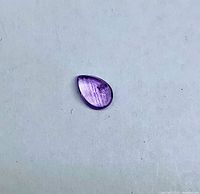 Top view of pear cabochon amethyst