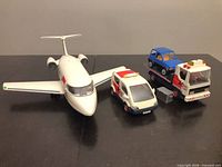 Full set: jet, ambulance, tow truck with car, accessories visible