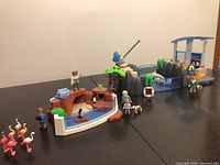 Full view of both Playmobil marine enclosures with figures and accessories displayed