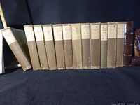 Front row showing all 12 matched cloth volumes