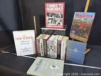 Group shot of all ~12 books including two New Yorker volumes, Times to Remember and The Mounties