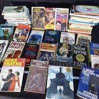 Overall view showing stacks and rows of paperback books and magazines