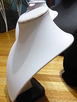 Side view of white display and adjacent black displays