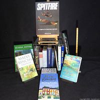 Group shot of all books including Spitfire on easel and Maeve Binchy novels in front