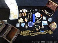 Overview of entire lot laid out on black surface