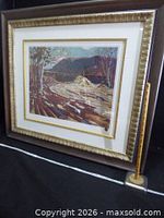 Framed print with mat and ruler for scale